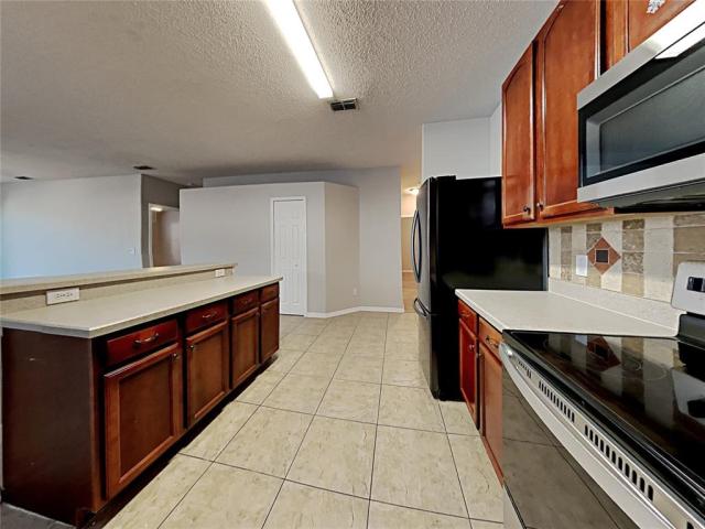 716 KNOLLWOOD DRIVE,DAVENPORT,Polk,Residential