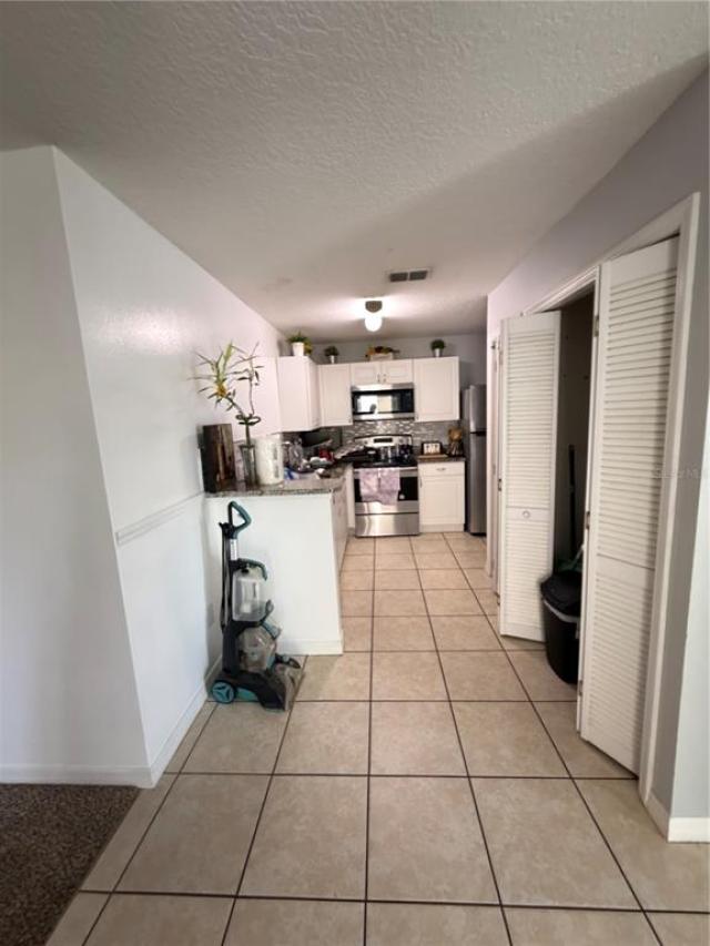 8819 GRAND PALMS CIRCLE UNIT A,KISSIMMEE,Osceola,Residential