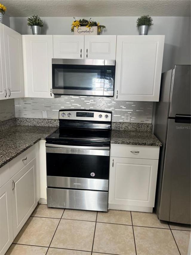 8819 GRAND PALMS CIRCLE UNIT A,KISSIMMEE,Osceola,Residential