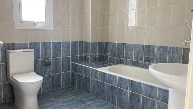 3 bedroom, second floor apartment with large 72m2 veranda and private access, on fully refurbished complex in fantastic village location in Liopetri -